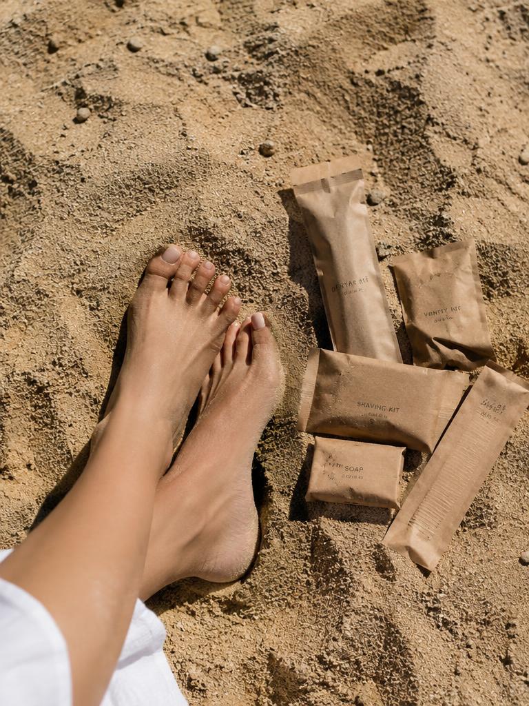 Paper-wrapped amenities on sand