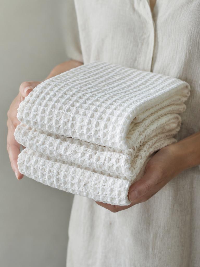 Hands holding waffle linens